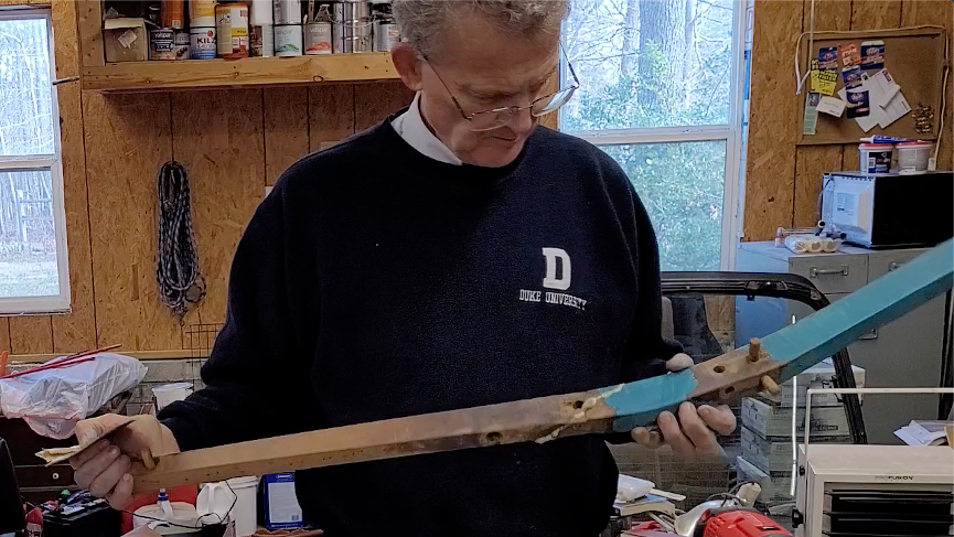 Inspecting a glued and filled piece before sanding.