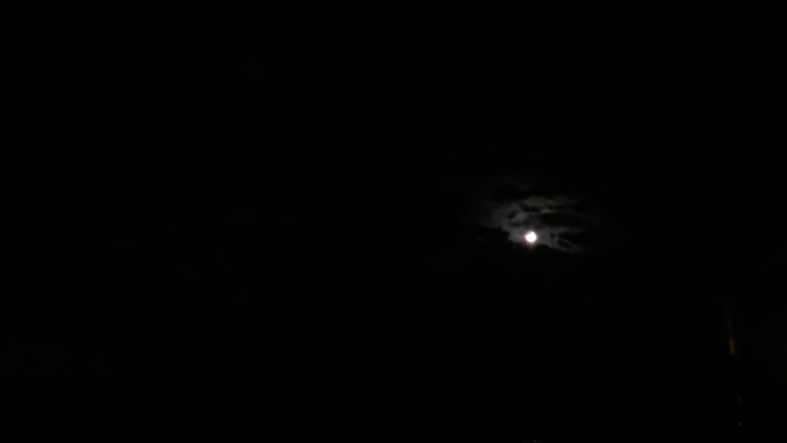 Moon in dark sky