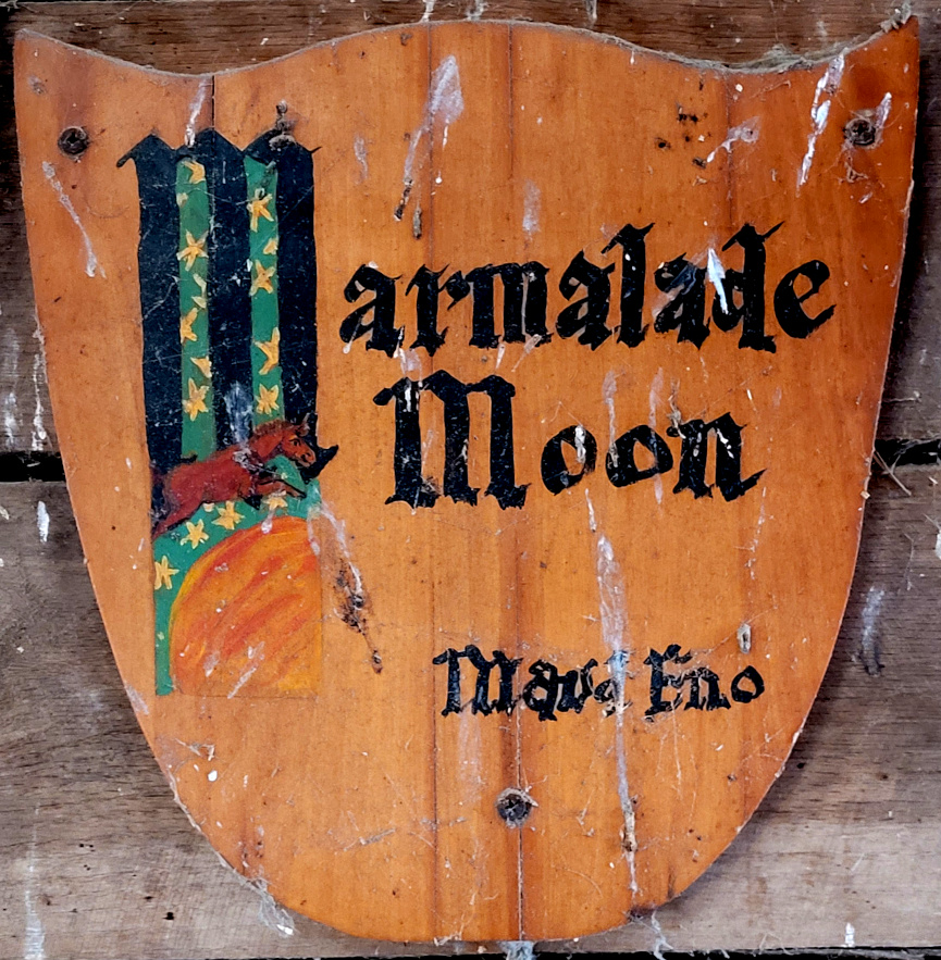 an artistic name plate for a horse stall.