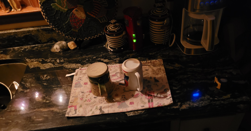 coffee cups on a towel, in preparation for morning