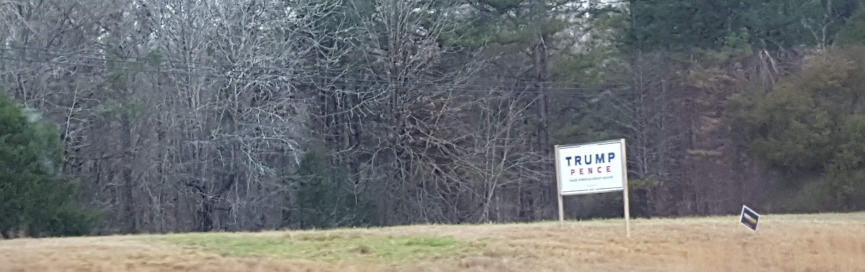 Trump / Pence sign along highway.