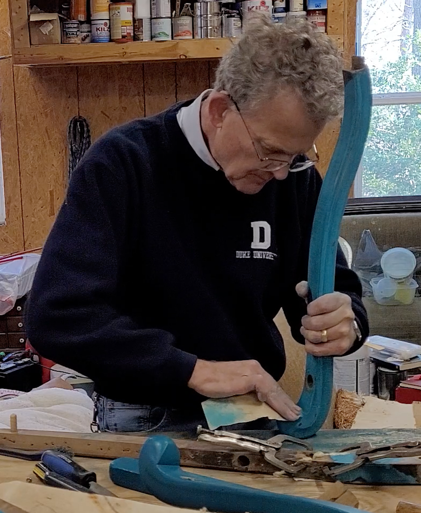 Sanding a chair arm