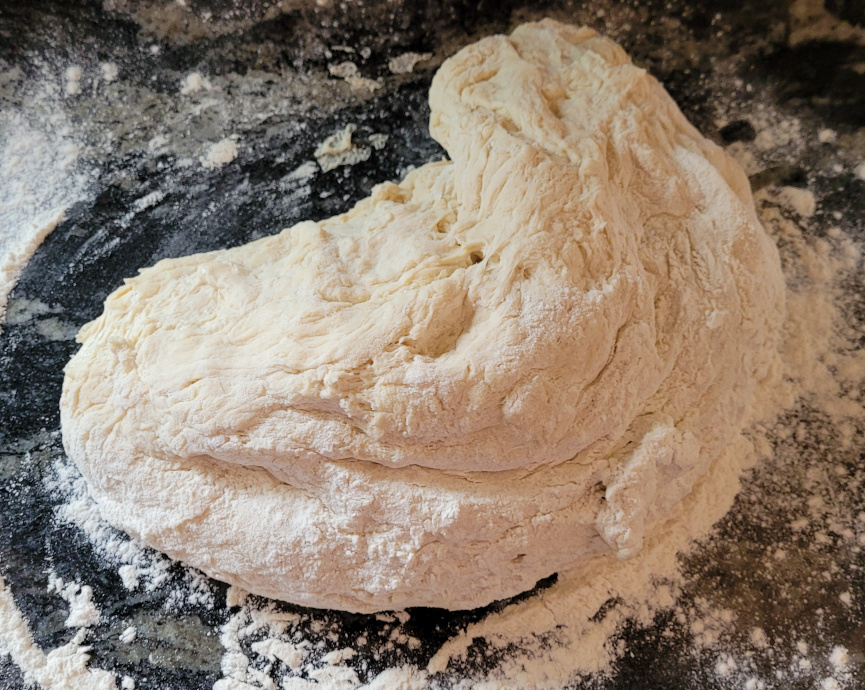 bread dough being kneaded